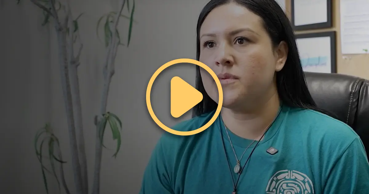 A woman being interviewed as part of a video about her journey from substance use to becoming a Harm Reduction worker.